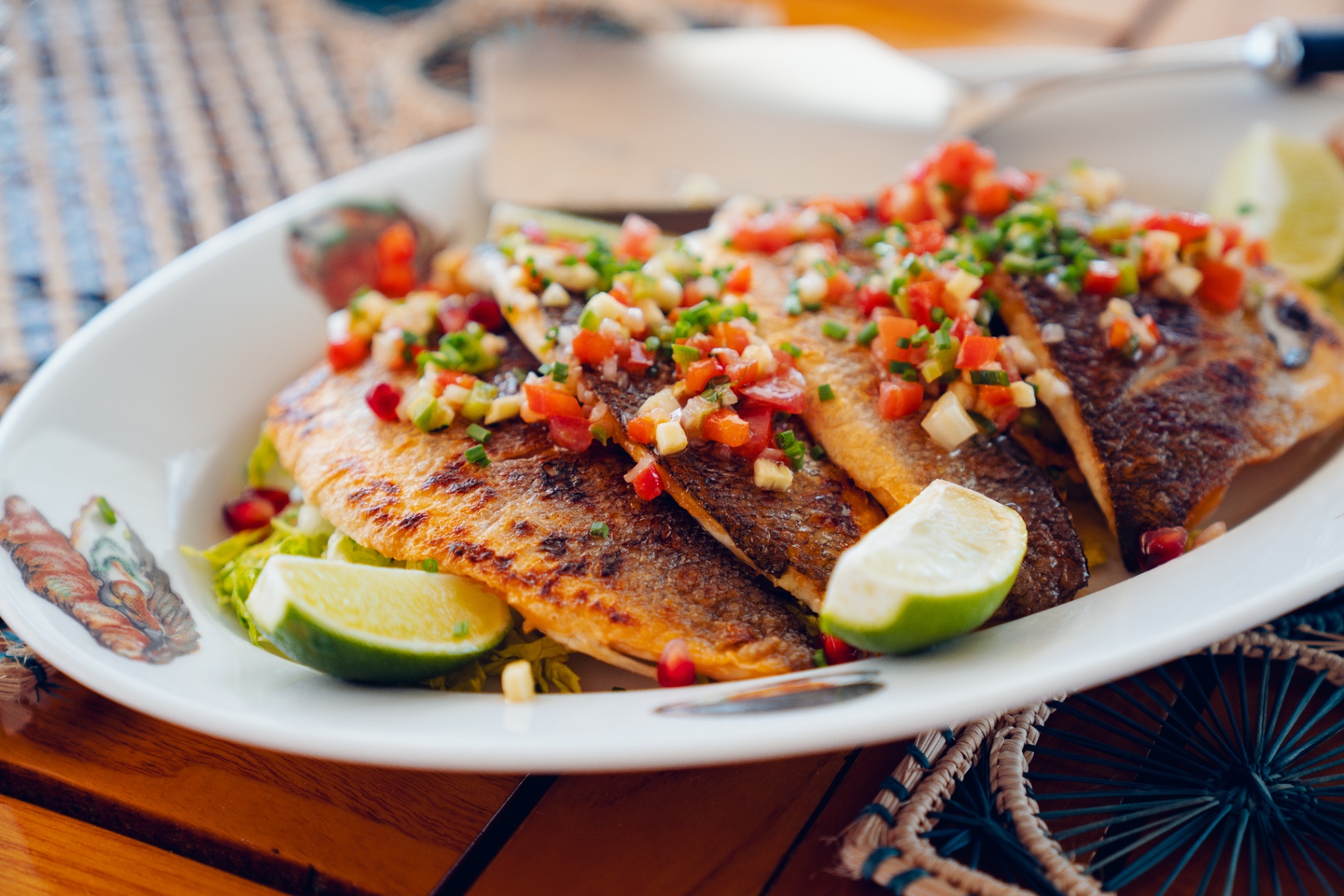 Freshly prepared seared fish with salsa