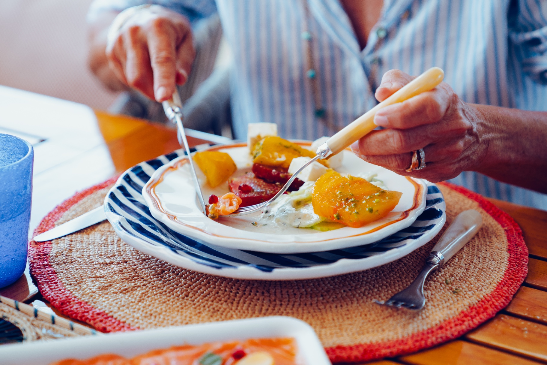 Guest enjoying a plated lunch on board