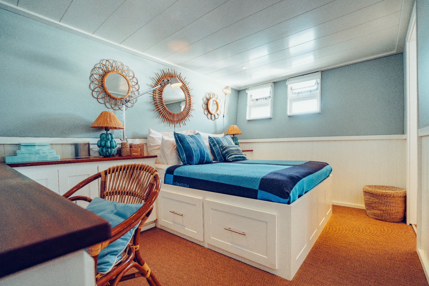 Guest cabin with blue textiles